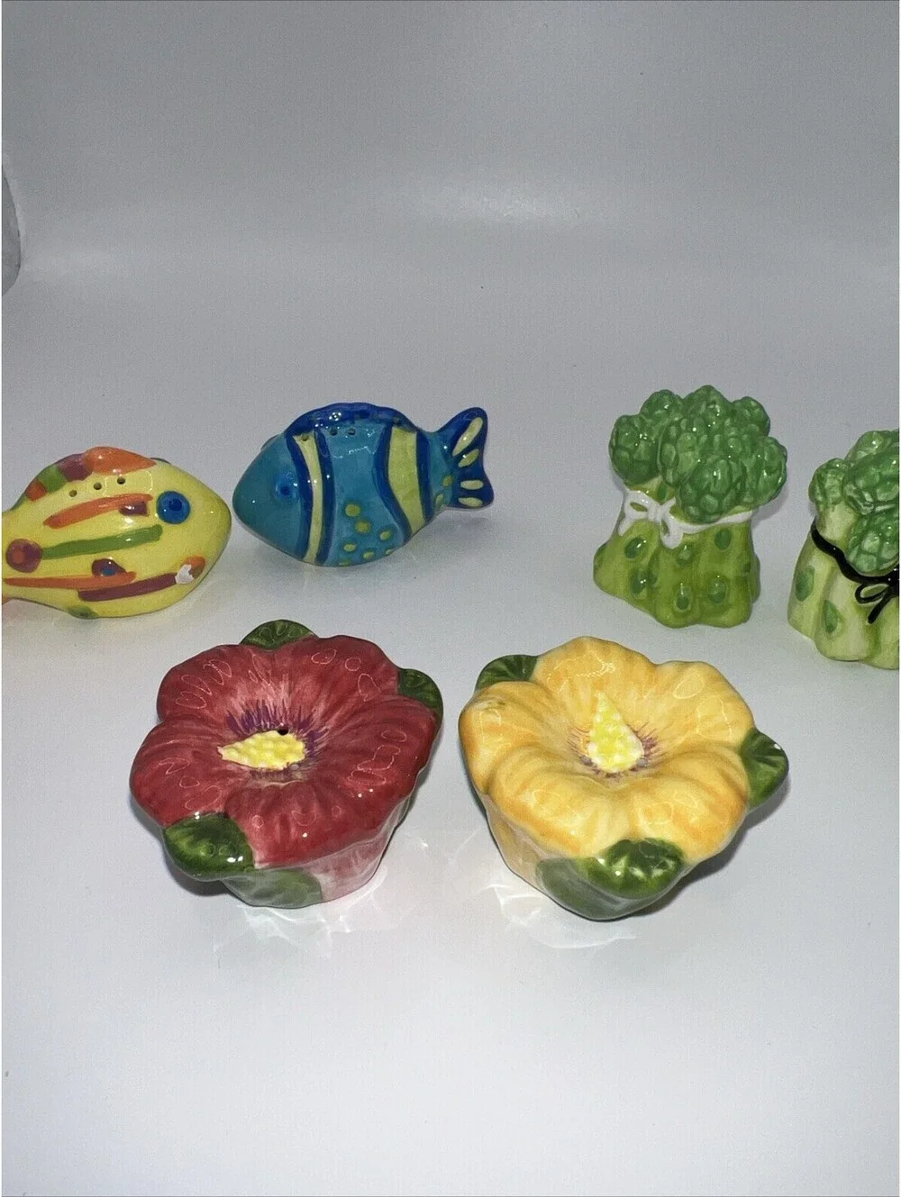 3 Sets Of Mini Salt And Pepper Shakers.